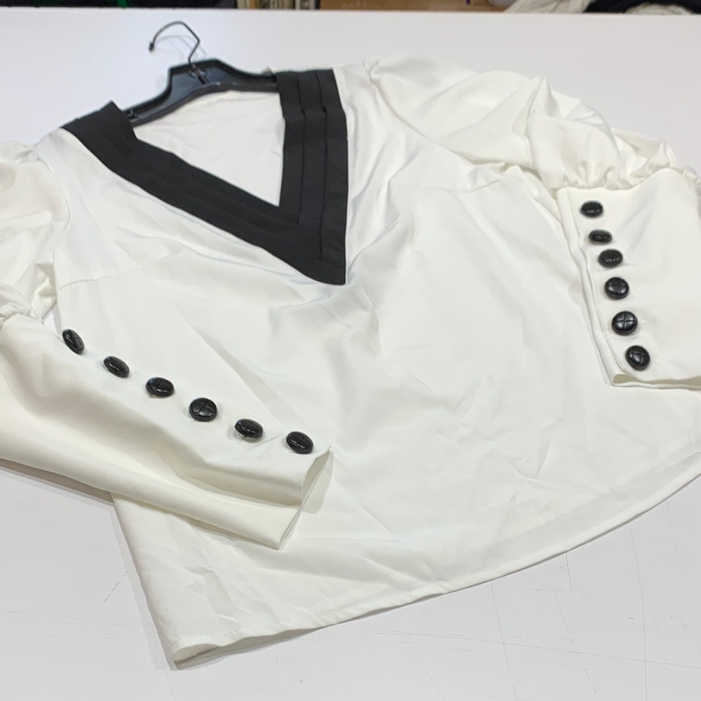 SHEIN black and white top with button sleeves.  Brand new size small